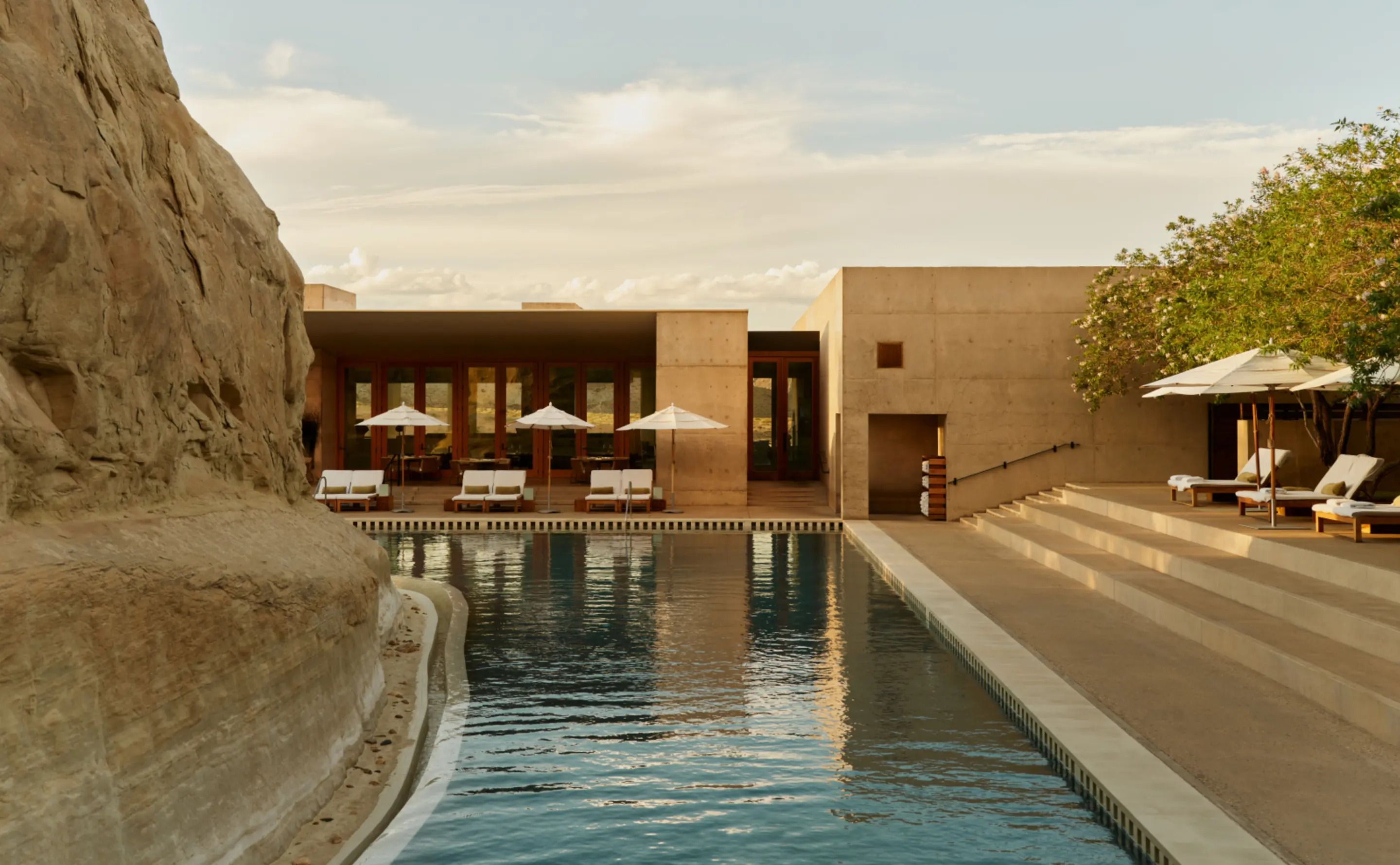 The pool wrapping around sandstone at Amangiri, Utah